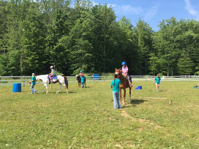 Hiram House Camp Horseback Riding Hiram House instructors teaching horseback riding
